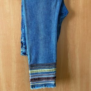 Cropped Anthro jeans with ribbon and fringe hem